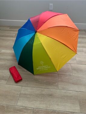 Rainbow umbrella with hospital logo new without tags
